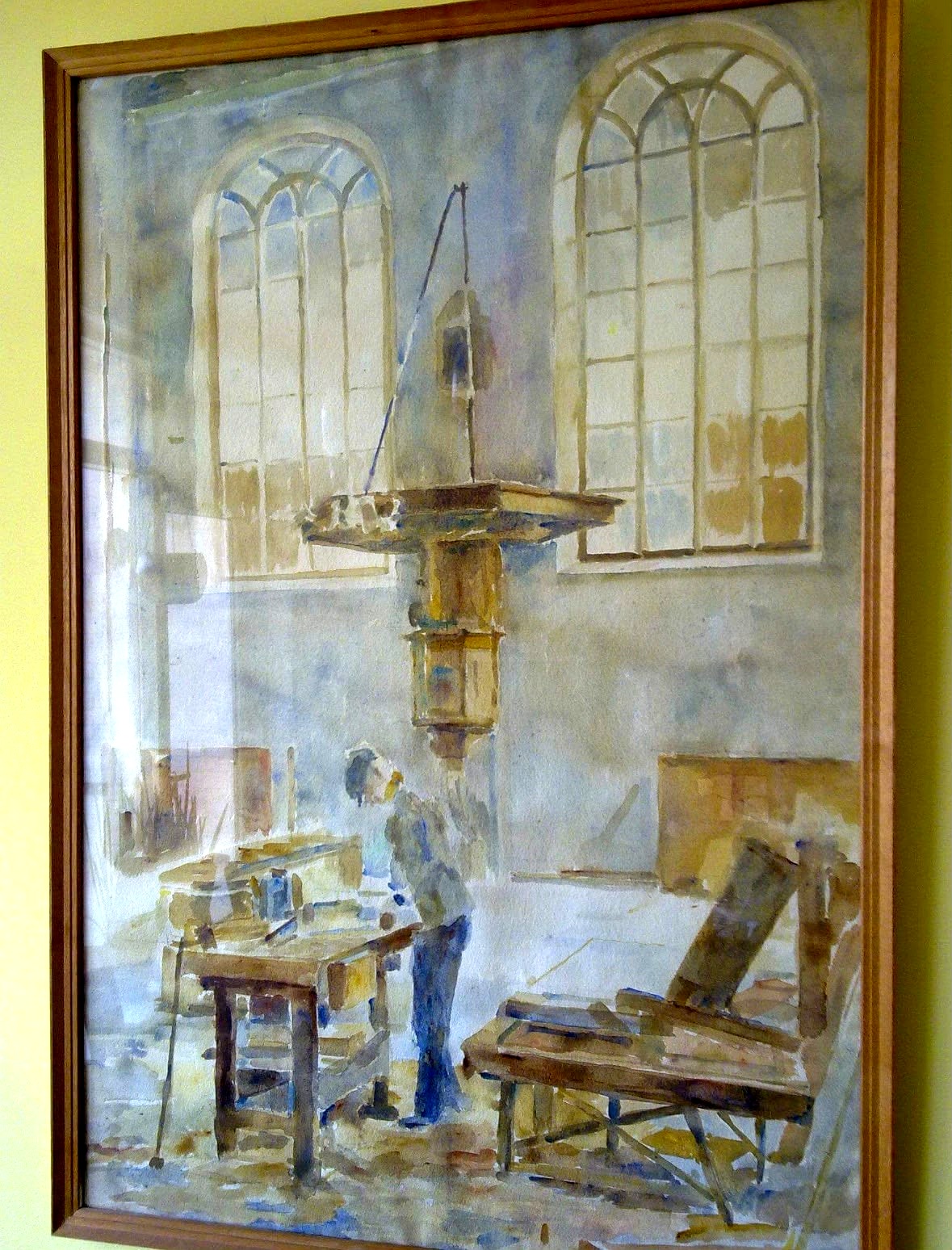 Aquarel van Hans Royaards aan het werk in de kerk van Middenbeemster